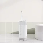 Mini IPX7 waterdichte monddouche voor thuis en op reis Waterflosser